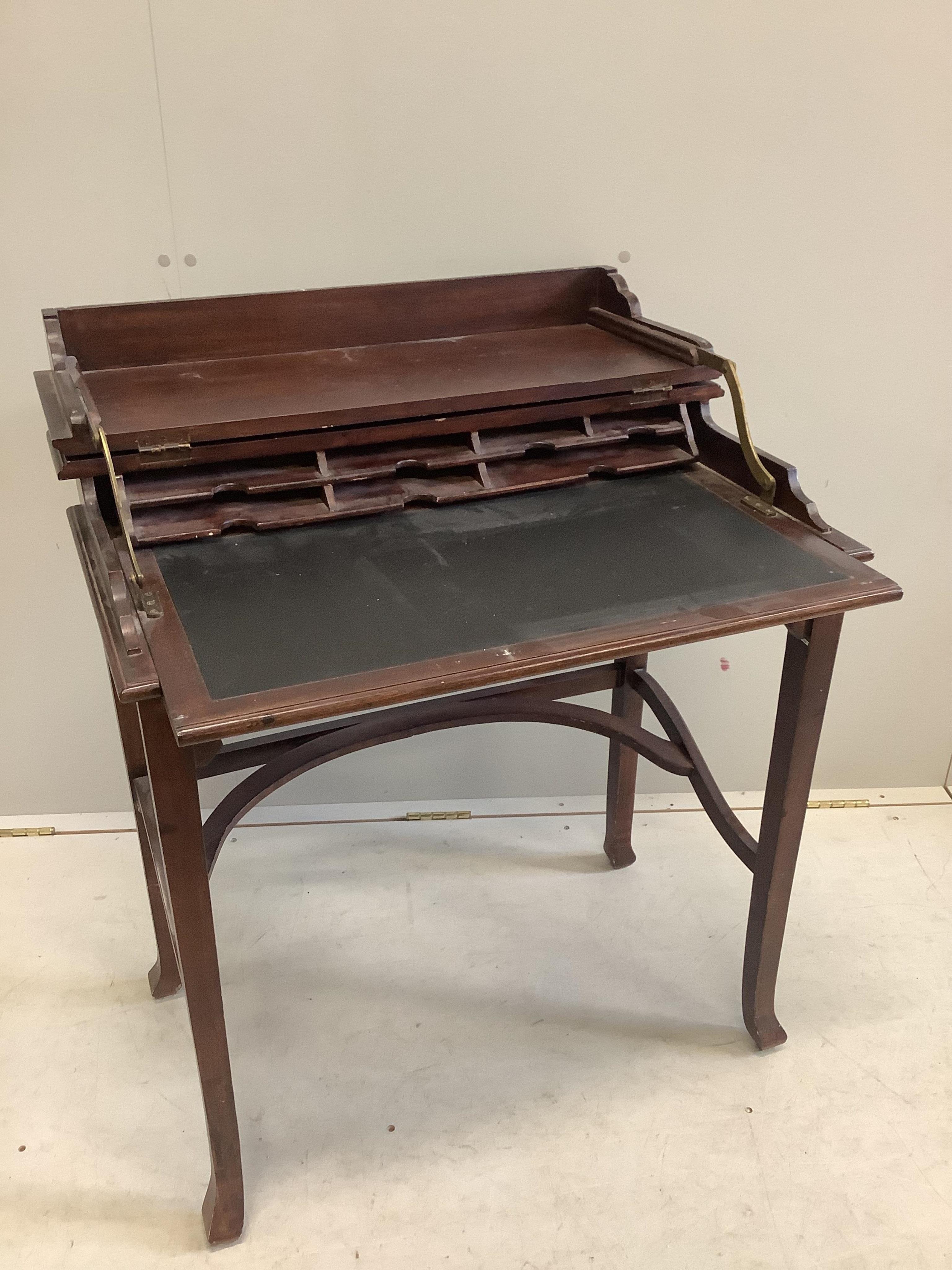 A reproduction OKA hardwood writing table, width 75cm, depth 43cm, height 80cm. Condition - fair